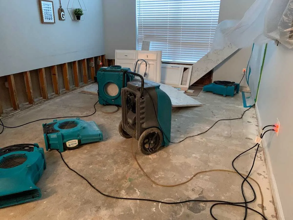 Dehumidifier in flood-cut room for Water Damage Restoration in Grayson