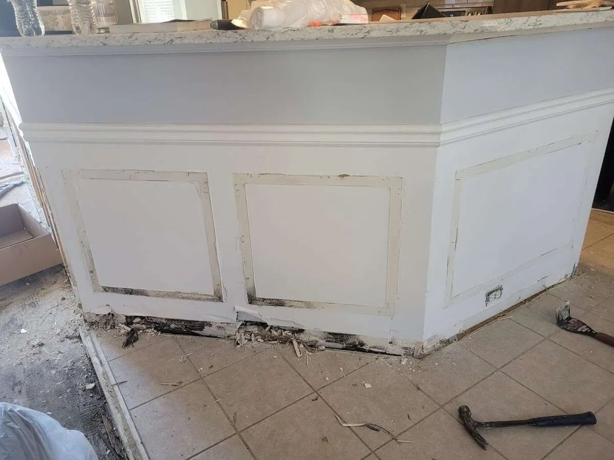 Water damage and mold on kitchen during Storm Damage Restoration in Grayson